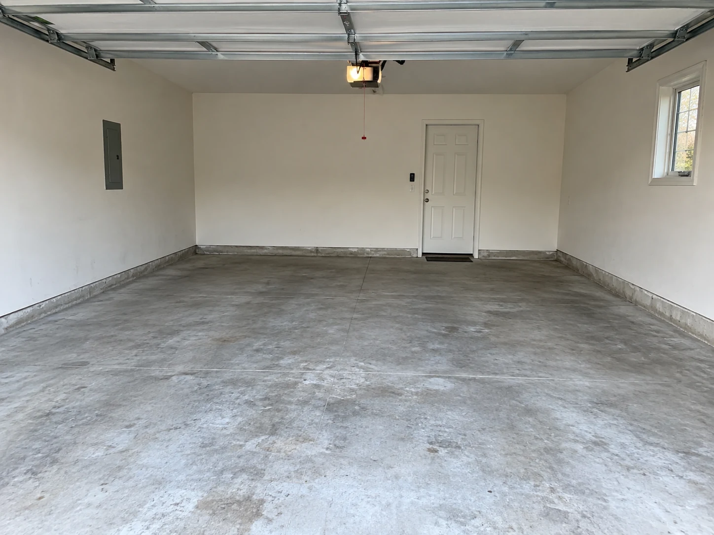 Example property cleanout showing a clean empty garage
